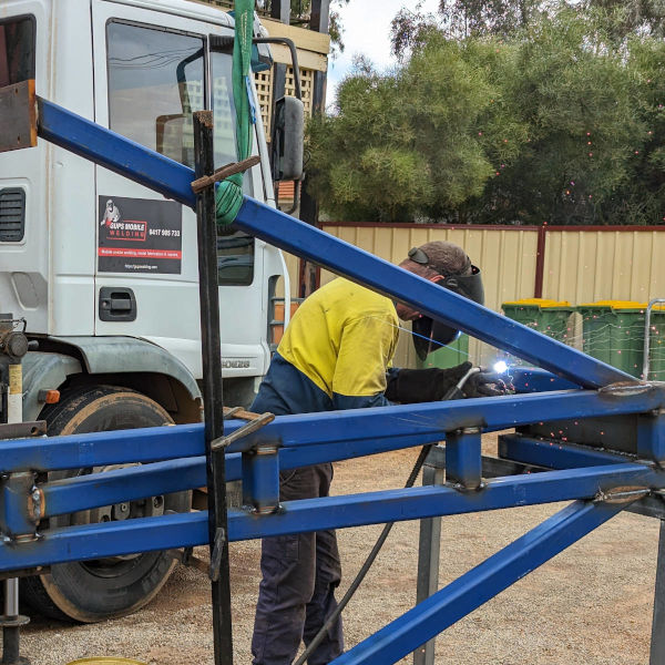 Image showing Gup fabricating a tow hitch for seeder bar for farm near Mollerin Rock