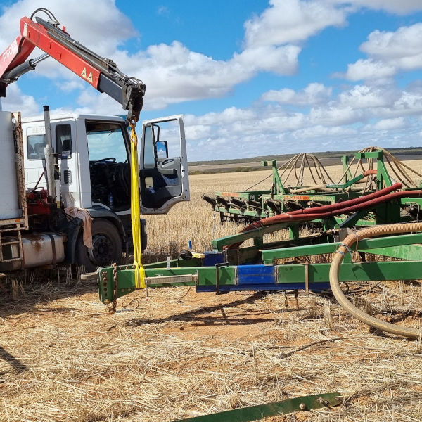 Image showing Gup the boilermaker welder repairing an an air seeder A frame bar for a farm in Gabbin, Central Wheatbelt of Western Australia