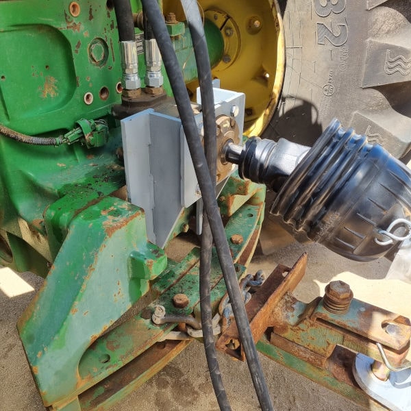 Fabricated and welded hydro motor brackets for tractor gear box