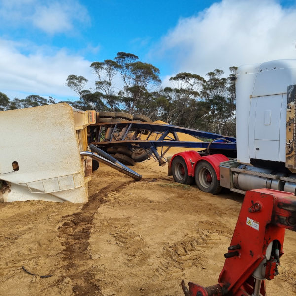 Boilermaker callout to cut tipped over trailer from prime mover truck