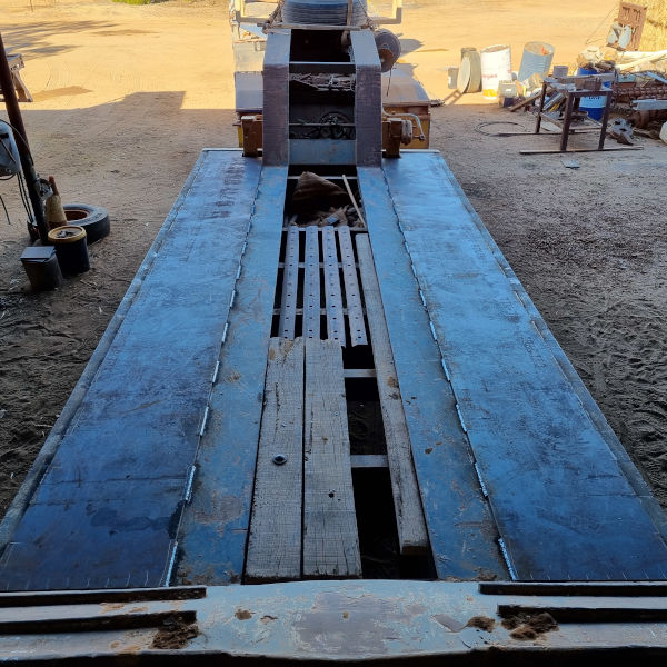 boilermaker replacing boards with heavy plate low loader trailer in Wyalkatchem.